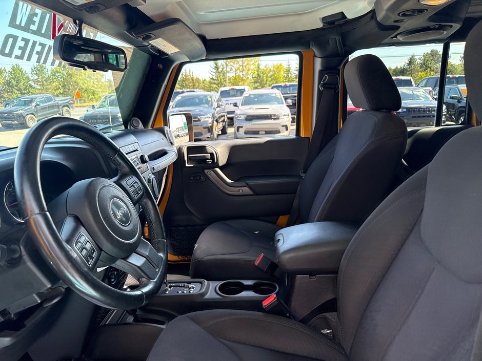 2014 Jeep Wrangler Unlimited Sport Amazing condition, power windows, AC, etc.