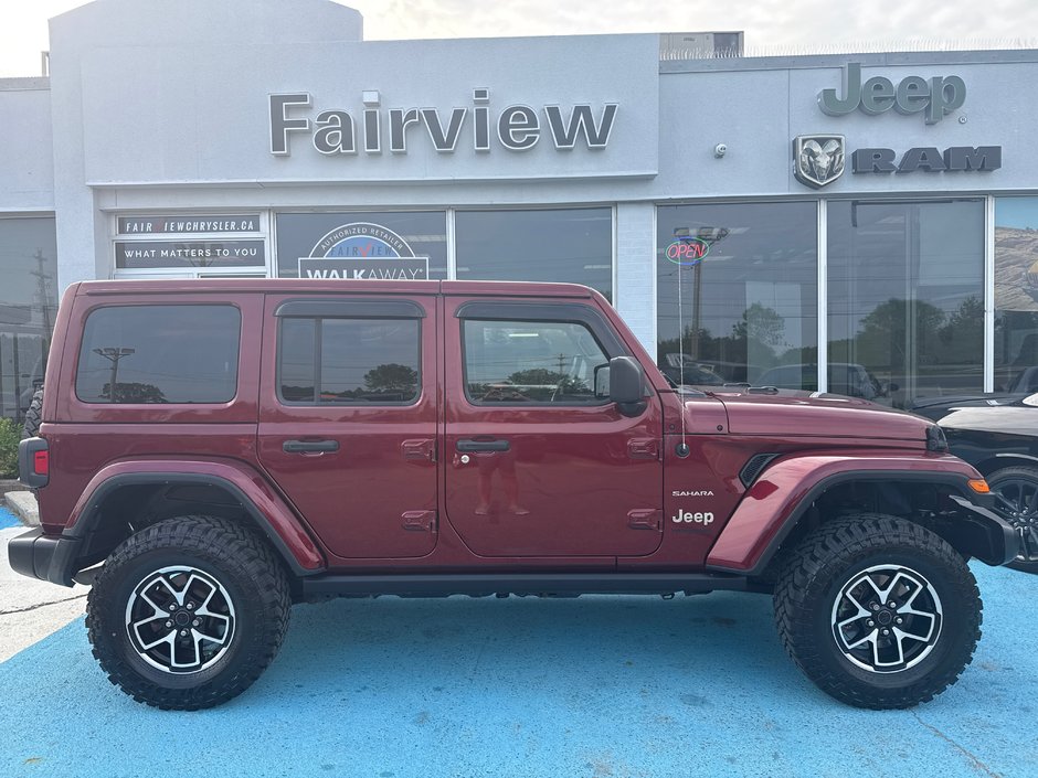 2021 Jeep Wrangler Unlimited Sahara leather loaded Fox lift kit, package brand new Rubicon rims and wild teak tires !!