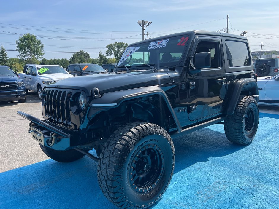 2022 Jeep Wrangler Sport with 10k in accessories With it 4 inch lift kit, 35 inch tire and wheel package, bumpers, fender, flares, and much more