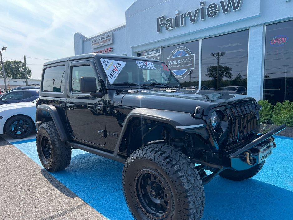 2022 Jeep Wrangler Sport with 10k in accessories With it 4 inch lift kit, 35 inch tire and wheel package, bumpers, fender, flares, and much more