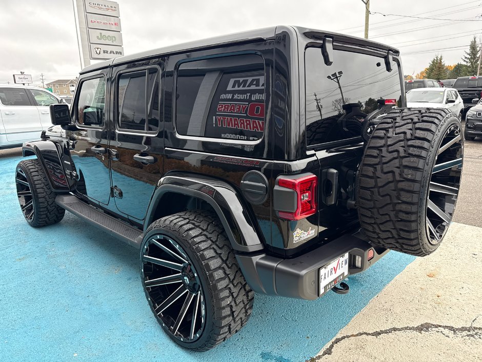 2024 Jeep Wrangler Sahara Fully loaded leather colour matching top over $7000 in tires and rims