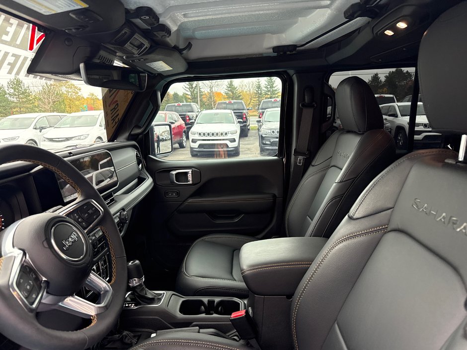 2024 Jeep Wrangler Sahara Fully loaded leather colour matching top over $7000 in tires and rims