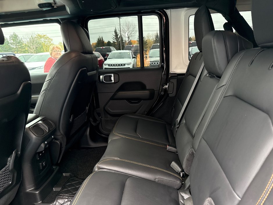 2024 Jeep Wrangler Sahara Fully loaded leather colour matching top over $7000 in tires and rims