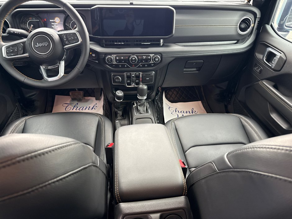 2024 Jeep Wrangler Sahara Fully loaded leather colour matching top over $7000 in tires and rims