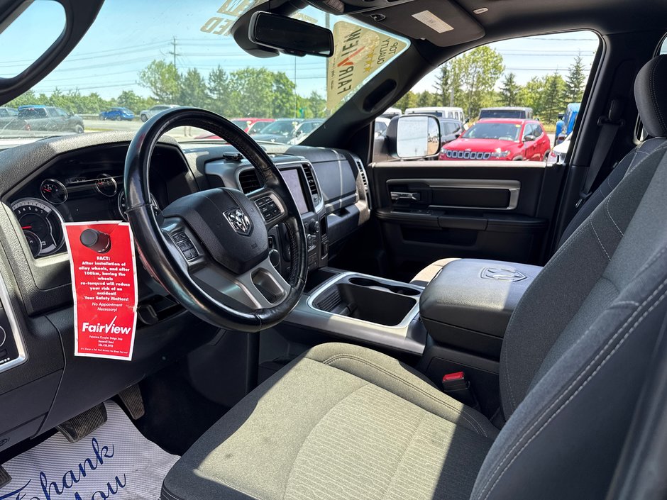 2021 Ram 1500 Classic Warlock V8 hemi Loaded with a sunroof, heated seat, heated wheel navigation, etc.