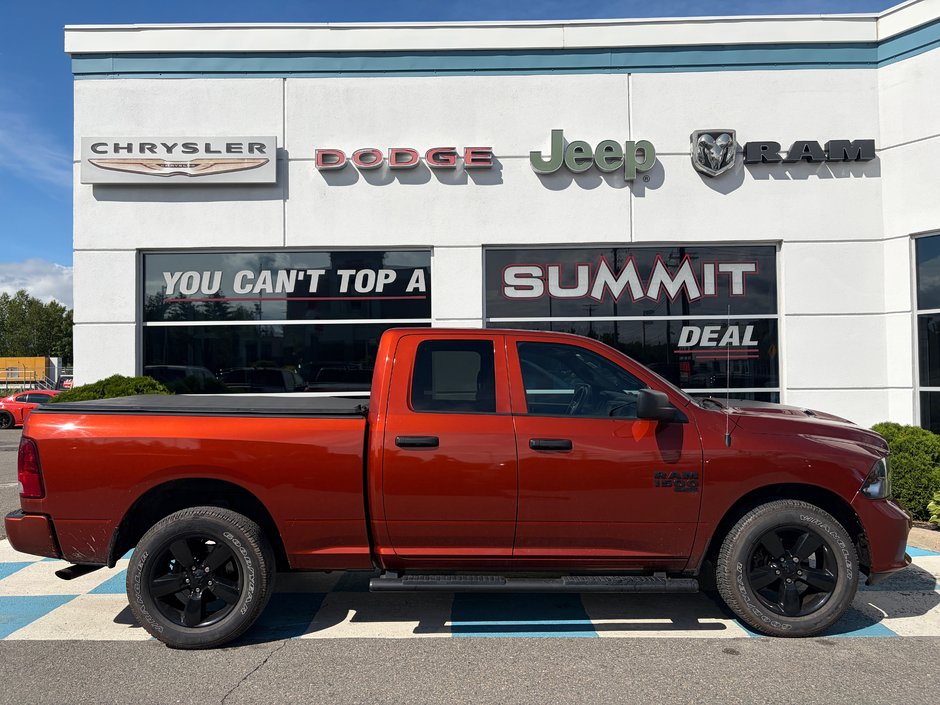 2023 Ram 1500 CLASSIC EXPRESS V6 QUAD CAB IN HARVEST ORANGE! LOW KM!