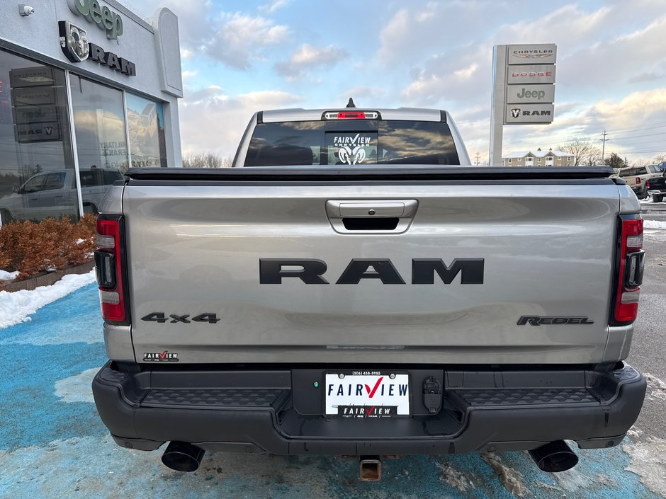 2019 Ram 1500 Rebel  aftermarket exhaust, full panel roof 12 inch screen Alpine audio much more