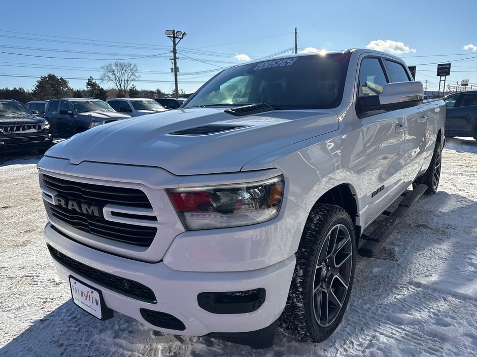 2021 Ram 1500 Sport Upgraded rims and tires, hard tunnel, cover side steps