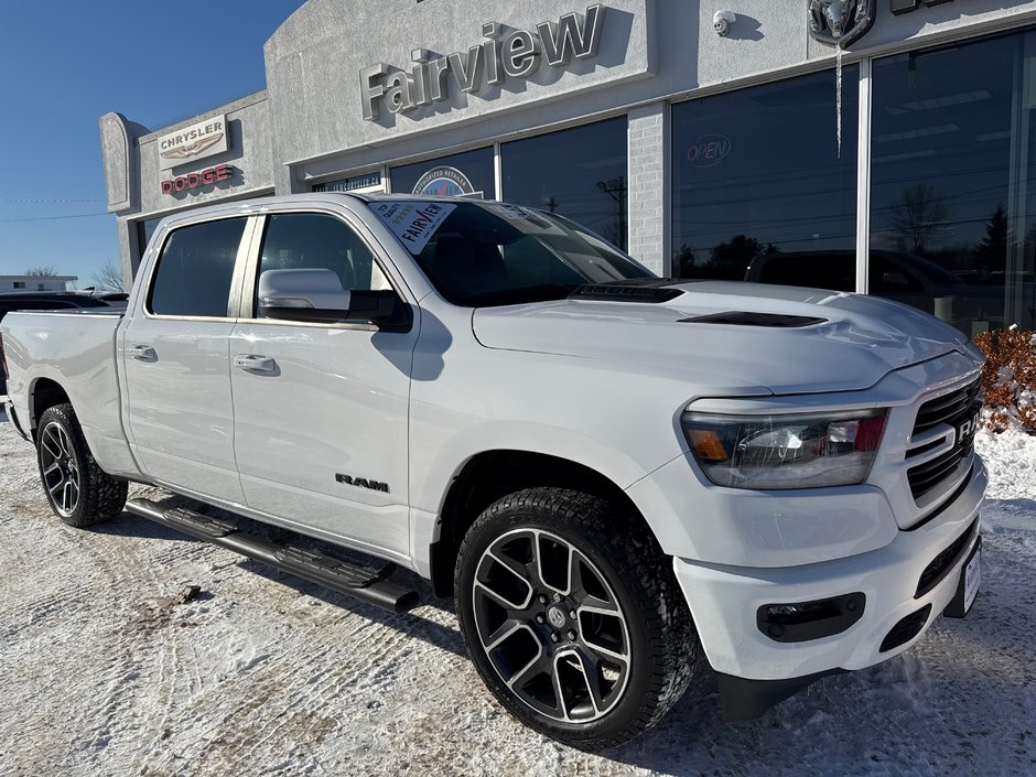 2021 Ram 1500 Sport Upgraded rims and tires, hard tunnel, cover side steps