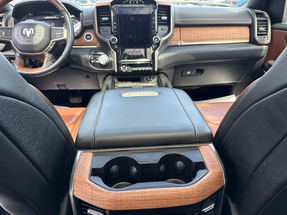 2022 Ram 1500 Limited Longhorn Fully loaded hard Tonnele cover, upgraded tires, cool seating heated seating 12 inch screen, etc.