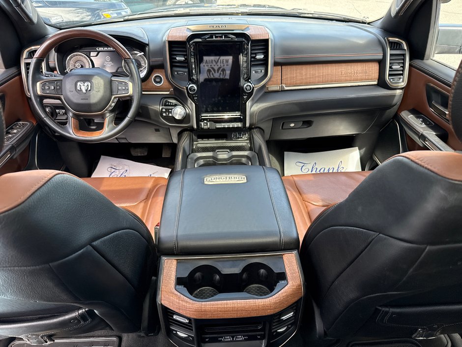 2022 Ram 1500 Limited Longhorn Fully loaded hard Tonnele cover, upgraded tires, cool seating heated seating 12 inch screen, etc.