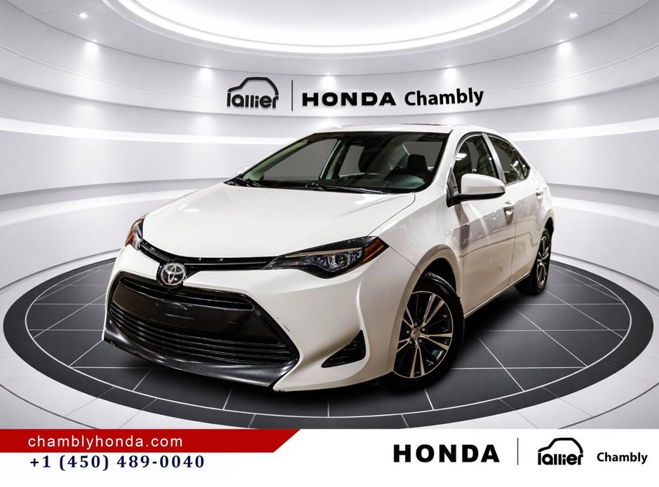 2018 Toyota Corolla LE 70,000 KM I HEATED SEATS AND STEERING WHEEL I CAMERA  I SUNROOF I MAGS I  ACTIVE SECURITY in Montréal, Quebec