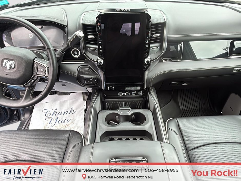 2026 Ram 2500 Rebel Three TV screens two charging stations air rise suspension MSRP 118,987