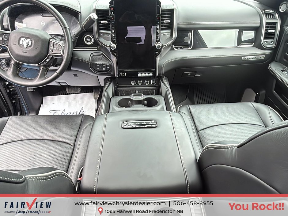 2026 Ram 2500 Rebel Three TV screens two charging stations air rise suspension MSRP 118,987