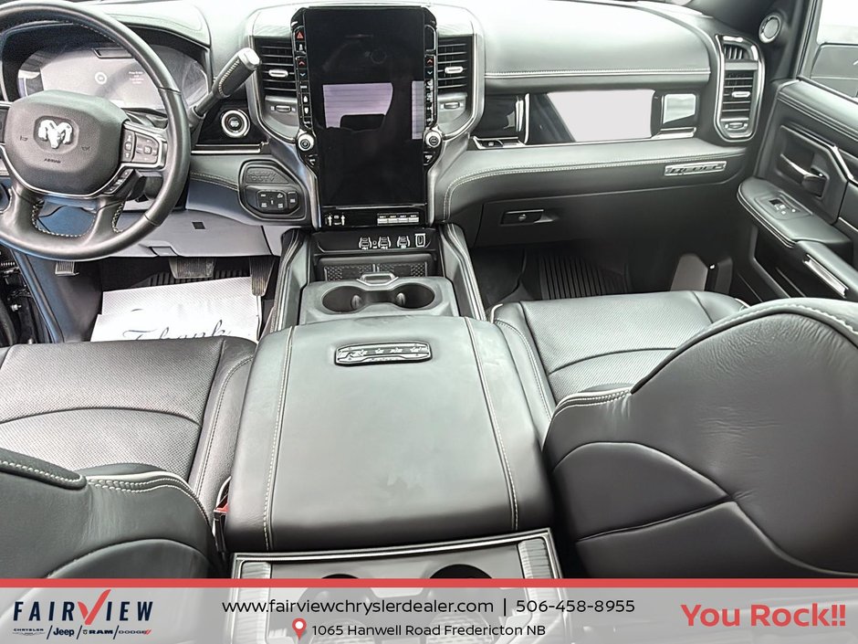 2026 Ram 2500 Rebel Three TV screens two charging stations air rise suspension MSRP 118,987