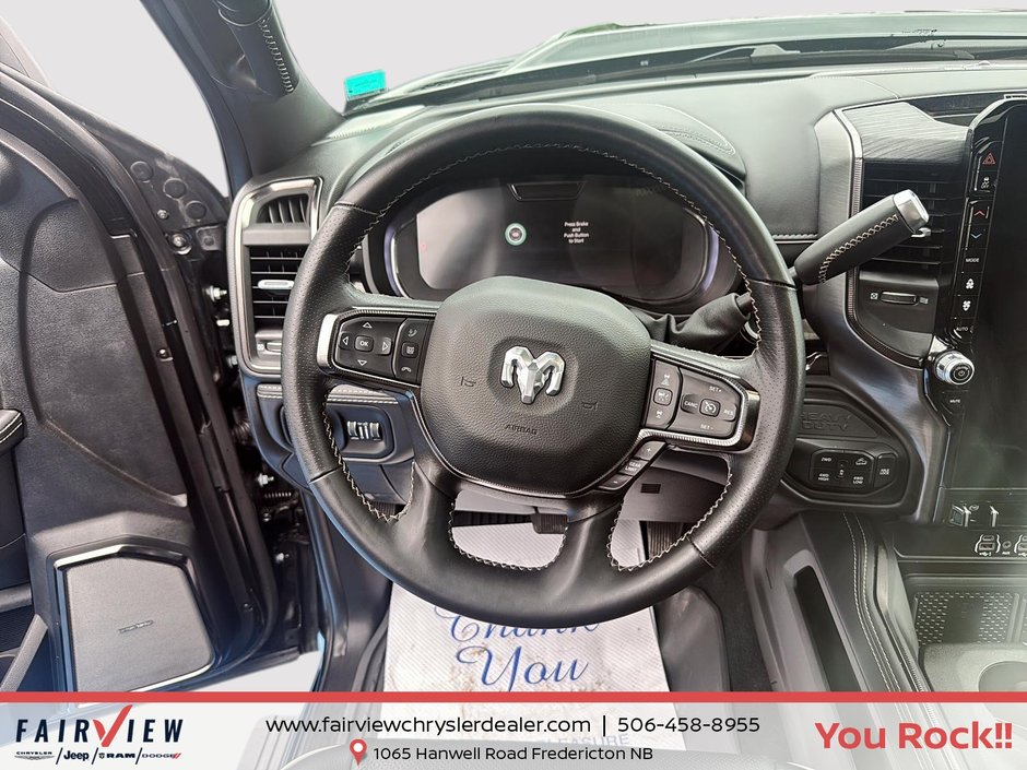 2026 Ram 2500 Rebel Three TV screens two charging stations air rise suspension MSRP 118,987