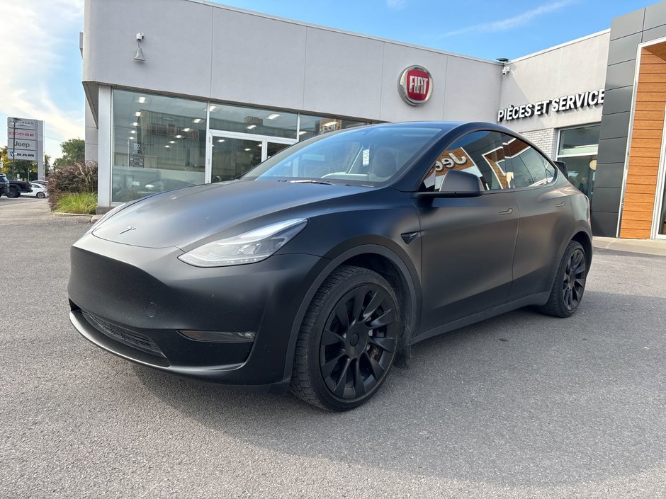 2023 Tesla Model Y LONG RANGE AWD in Pointe-Aux-Trembles, Quebec - w940px