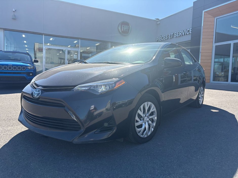 2017 Toyota Corolla in Pointe-Aux-Trembles, Quebec - w940px