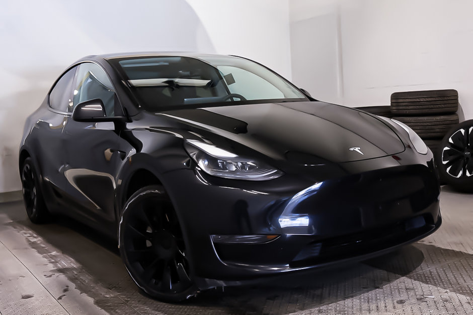 2023 Tesla Model Y SR + RWD + TOIT DE VERRE PANO + CUIR in Terrebonne, Quebec - w940px