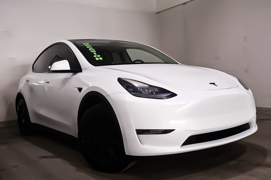 2023 Tesla MODEL Y RWD + CUIR + TOIT DE VERRE PANO in Terrebonne, Quebec - w940px