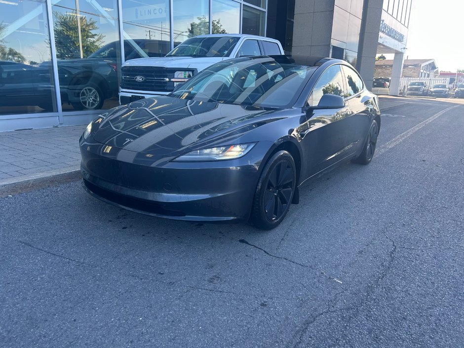 2024 Tesla Model 3 in Brossard, Quebec - w940px