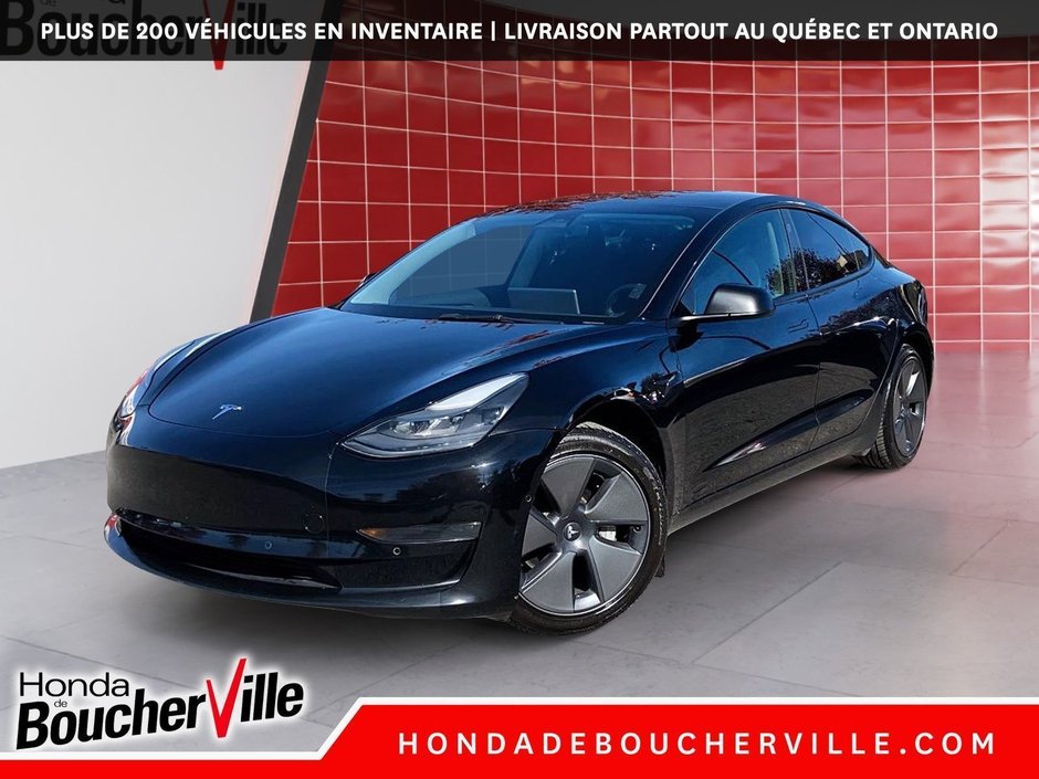 2021 Tesla Model 3 STANDARD RANGE PLUS in Terrebonne, Quebec - w940px