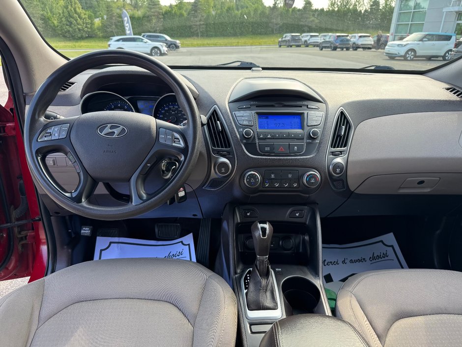 Hyundai Tucson GL TA DEMARREUR SIEGES CHAUFFANTS BLUETOOTH 2015 INSPECTE+AIR CLIMATISE+RADIO SIRIUS+REGULATEUR DE VITESSES+GROUPE ELECTRIQUE+COMMANDES AU VOLANT