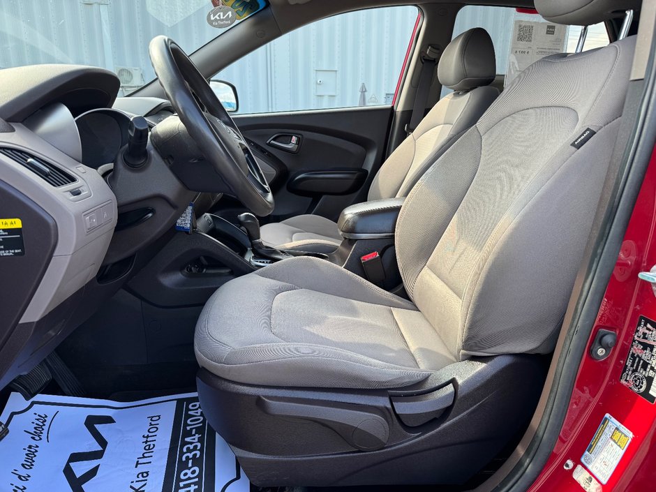 Hyundai Tucson GL TA DEMARREUR SIEGES CHAUFFANTS BLUETOOTH 2015 INSPECTE+AIR CLIMATISE+RADIO SIRIUS+REGULATEUR DE VITESSES+GROUPE ELECTRIQUE+COMMANDES AU VOLANT