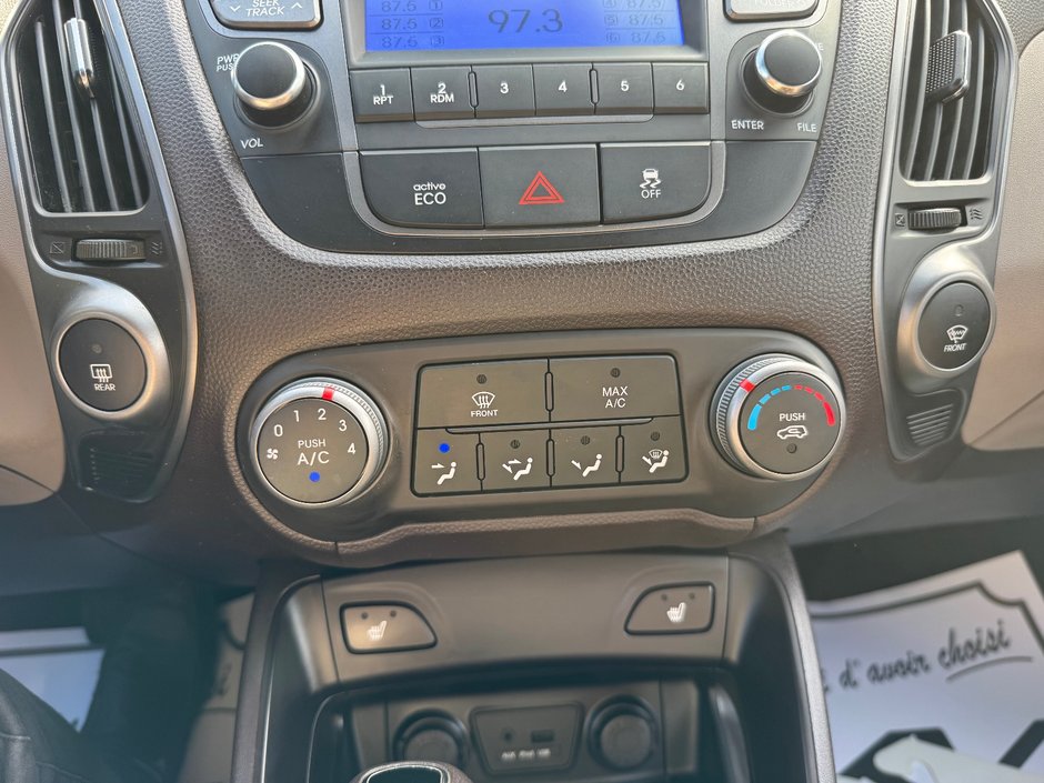 Hyundai Tucson GL TA DEMARREUR SIEGES CHAUFFANTS BLUETOOTH 2015 INSPECTE+AIR CLIMATISE+RADIO SIRIUS+REGULATEUR DE VITESSES+GROUPE ELECTRIQUE+COMMANDES AU VOLANT