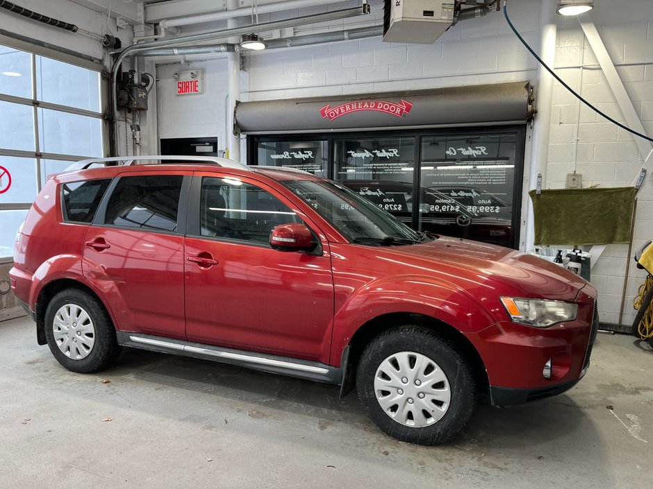 Mitsubishi Outlander AWD  1 PROPRIO TRES  BAS KM 2010 à Boucherville, Québec - w940px