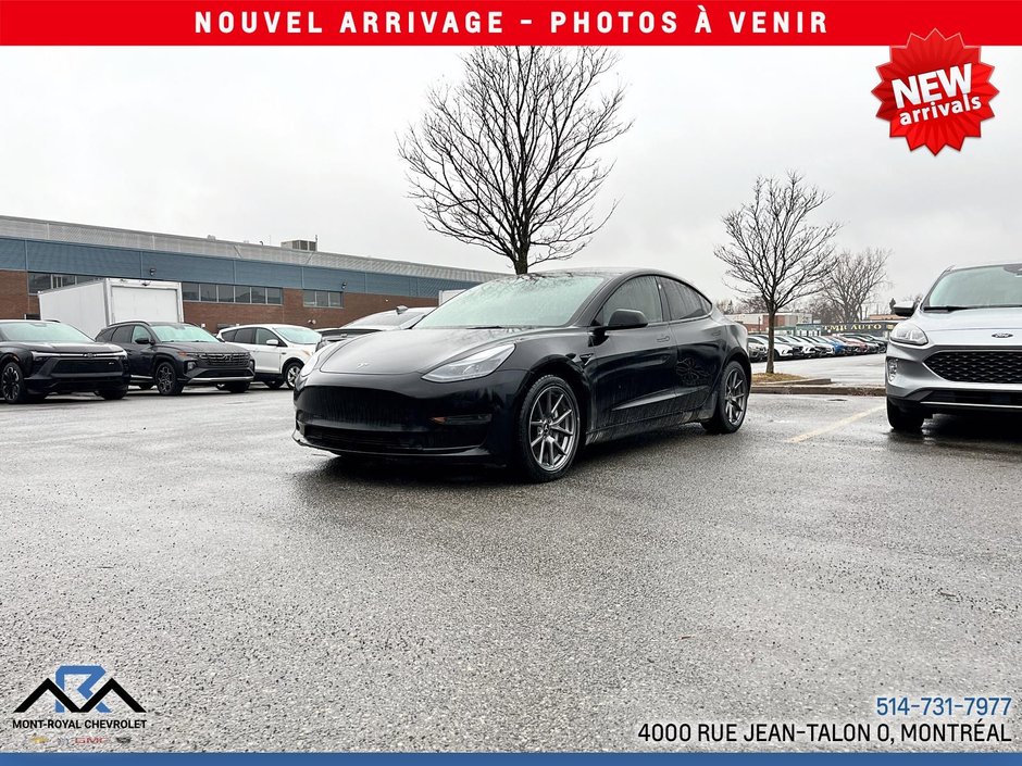 2023 Tesla Model 3 in Montreal, Quebec - w940px