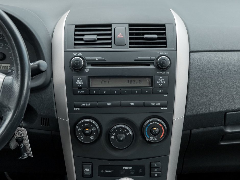 2010 Toyota Corolla 4-door Sedan S 5M-23