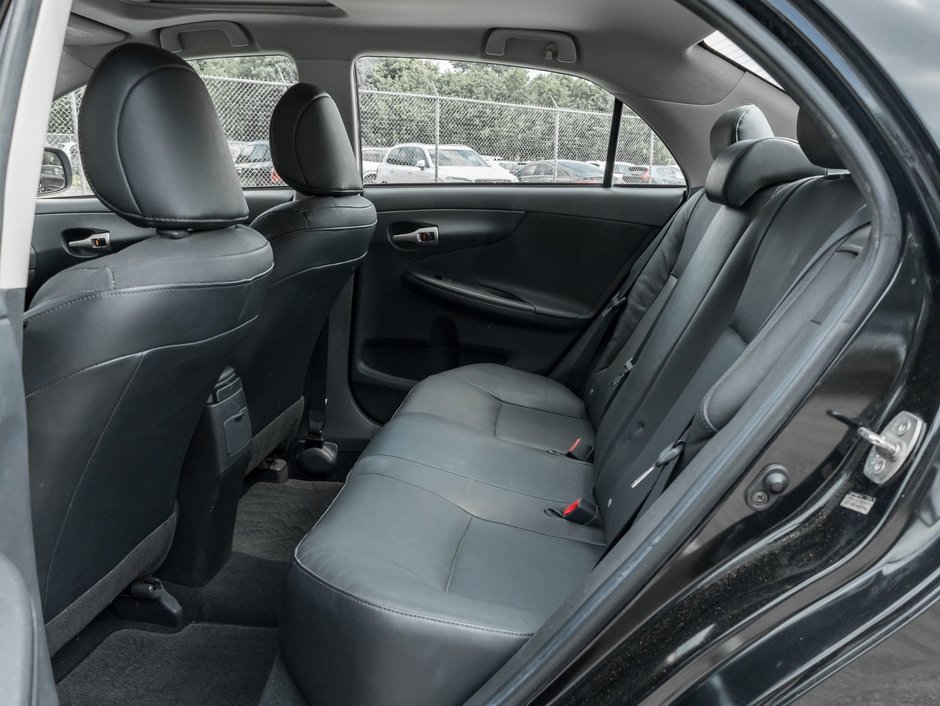2010 Toyota Corolla 4-door Sedan S 5M-21