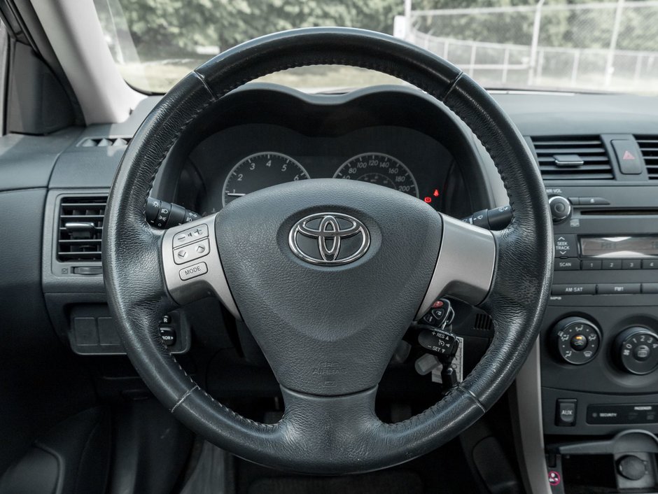 2010 Toyota Corolla 4-door Sedan S 5M-9