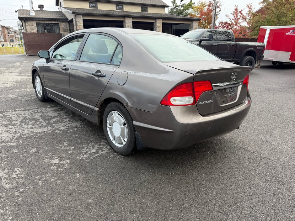 2010 Honda Civic Sdn DX-G-10