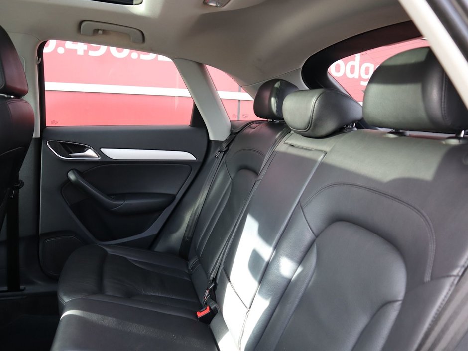 2017 Audi Q3 KOMFORT IN BLACK EQUIPPED WITH A 2.0L TURBO I4 , QUATTRO AWD , 6SPD AUTO , LEATHER HEATED SEATS , PREMIUM AUDIO , BACKUP CAM , D-18