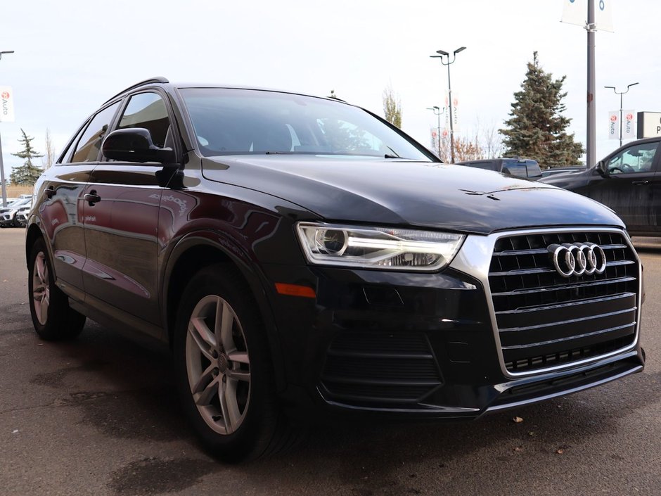 2017 Audi Q3 KOMFORT IN BLACK EQUIPPED WITH A 2.0L TURBO I4 , QUATTRO AWD , 6SPD AUTO , LEATHER HEATED SEATS , PREMIUM AUDIO , BACKUP CAM , D-10
