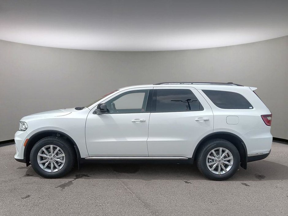 2024 Dodge Durango SXT IN WHITE KNUCKLE EQUIPPED WITH A 3.6L V6 , AWD , 8SPD AUTO , CLOTH HEATED SEATS + SW , 3RD ROW SEATING GROUP , BACKUP CAM ,-2