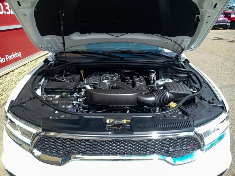 2024 Dodge Durango SXT IN WHITE KNUCKLE EQUIPPED WITH A 3.6L V6 , AWD , 8SPD AUTO , 3RD ROW SEATING GROUP , HEATED SEATS + SW , BACKUP CAM , BSM/RC-11