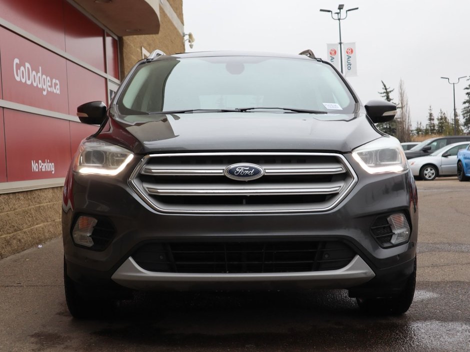 2018 Ford Escape TITANIUM IN GREY EQUIPPED WITH A 2.0L TURBO I4 , 4WD , 6SPD AUTO ,  LEATHER , PANO ROOF, NAV, REMOTE START , PREMIUM AUDIO , DUA-1