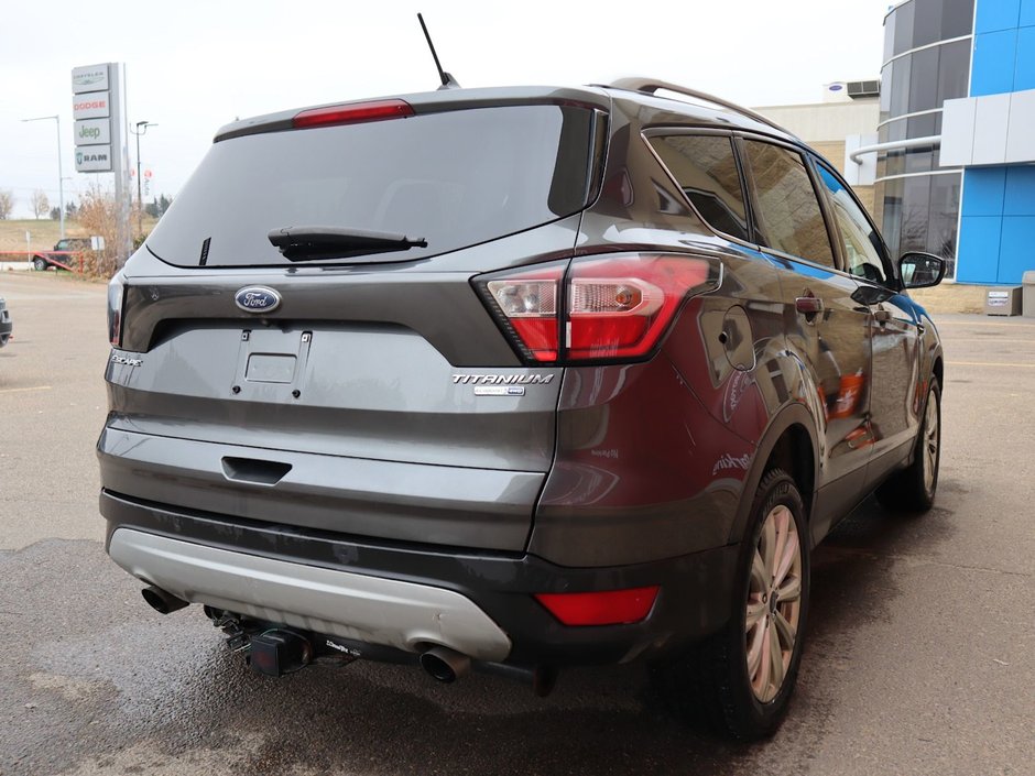 2018 Ford Escape TITANIUM IN GREY EQUIPPED WITH A 2.0L TURBO I4 , 4WD , 6SPD AUTO ,  LEATHER , PANO ROOF, NAV, REMOTE START , PREMIUM AUDIO , DUA-7