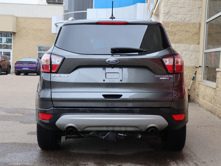 2018 Ford Escape TITANIUM IN GREY EQUIPPED WITH A 2.0L TURBO I4 , 4WD , 6SPD AUTO ,  LEATHER , PANO ROOF, NAV, REMOTE START , PREMIUM AUDIO , DUA-6