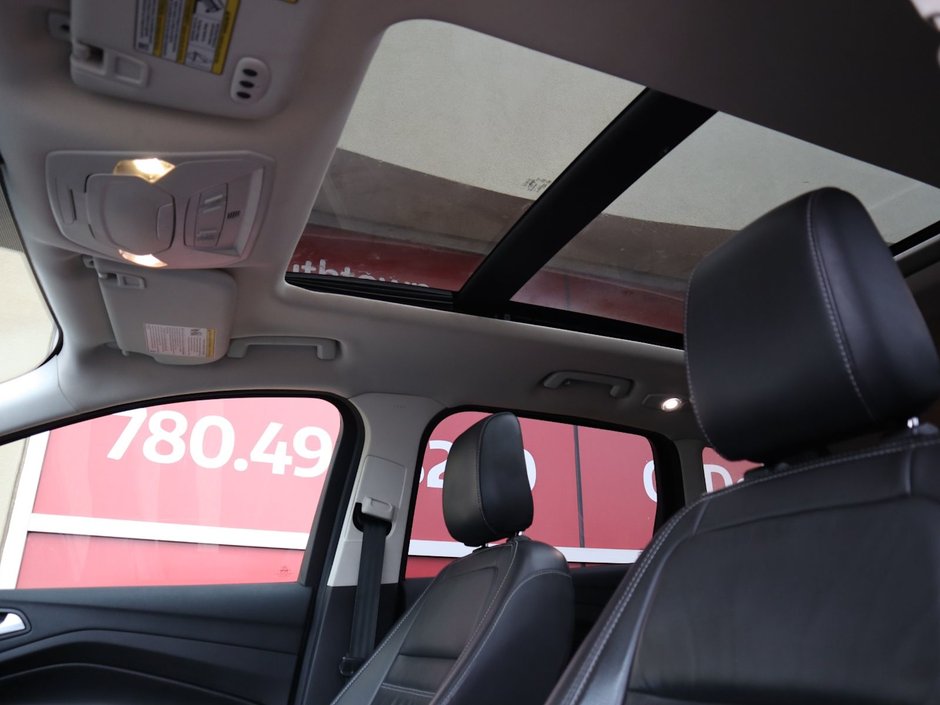 2018 Ford Escape TITANIUM IN GREY EQUIPPED WITH A 2.0L TURBO I4 , 4WD , 6SPD AUTO ,  LEATHER , PANO ROOF, NAV, REMOTE START , PREMIUM AUDIO , DUA-15