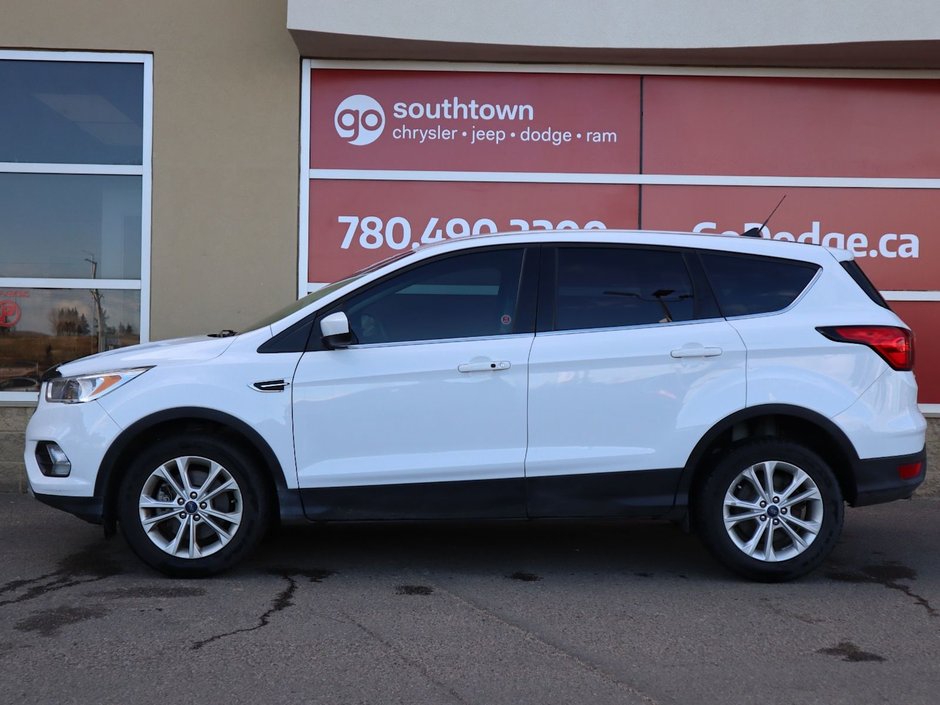 2019 Ford Escape SE IN WHITE EQUIPPED WITH A 1.5L TURBO I4 , 4X4 , 6SPD AUTO , CLOTH HEATED SEATS , DUAL ZONE AC , CRUISE , BACKUP CAM , SW CONTR-6