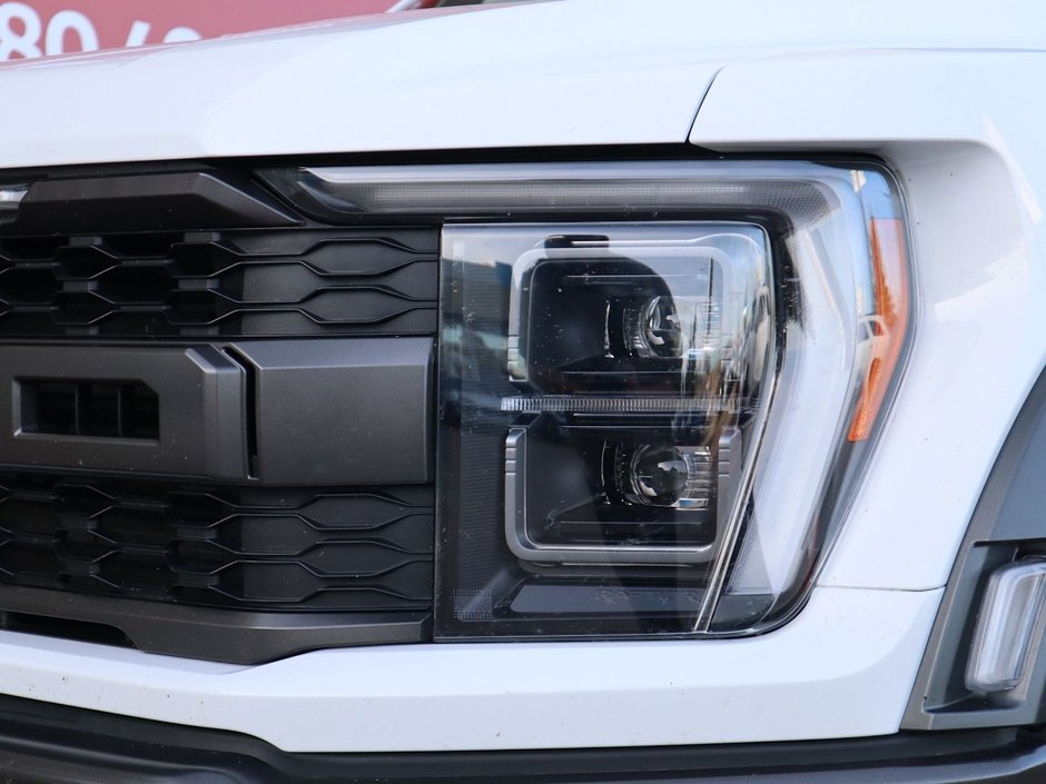 2022 Ford F-150 RAPTOR IN WHITE EQUIPPED WITH A HIGH OUTPUT 3.5L TURBO V6 , 4X4 , 10SPD AUTO , LEATHER HEATED/VENTED BUCKET SEATS , PREMIUM AUDI-3