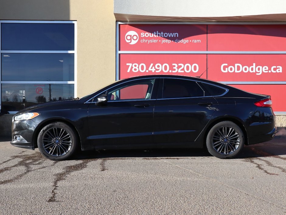 2014 Ford Fusion SE IN BLACK EQUIPPED WITH A 2.0L ECOBOOST I4 , AWD , 6SPD AUTO , LEATHER HEATED SEATS , BLUETOOTH , SW CONTROLS , SUNROOF , 18IN-6