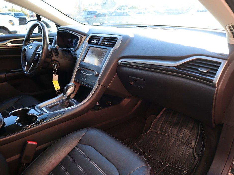 2014 Ford Fusion SE IN BLACK EQUIPPED WITH A 2.0L ECOBOOST I4 , AWD , 6SPD AUTO , LEATHER HEATED SEATS , BLUETOOTH , SW CONTROLS , SUNROOF , 18IN-20