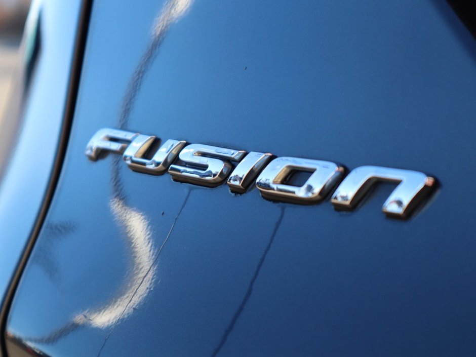 2014 Ford Fusion SE IN BLACK EQUIPPED WITH A 2.0L ECOBOOST I4 , AWD , 6SPD AUTO , LEATHER HEATED SEATS , BLUETOOTH , SW CONTROLS , SUNROOF , 18IN-12