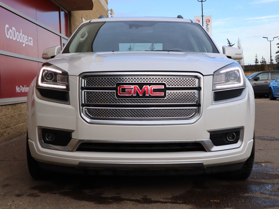 2016 GMC Acadia DENALI IN WHITE EQUIPPED WITH A 3.6L V6 , AWD , 6SPD AUTO , PREMIUM BOSE AUDIO , DUAL EXHAUST , SUNROOF , DUAL HEADREST DVD ENTE-1
