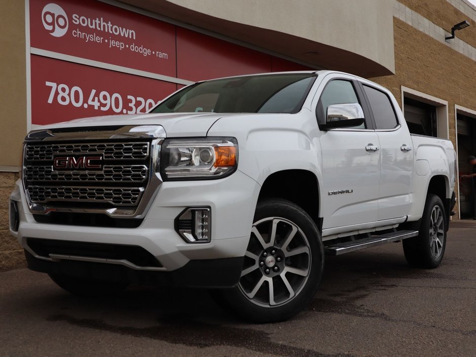 2022 GMC Canyon DENALI IN WHITE EQUIPPED WITH A 3.6L V6 , 4X4 , AUTO TRANSMISSION , LEATHER HEATED SEATS , BACKUP CAM , PREMIUM AUDIO , WOOD TRI-0